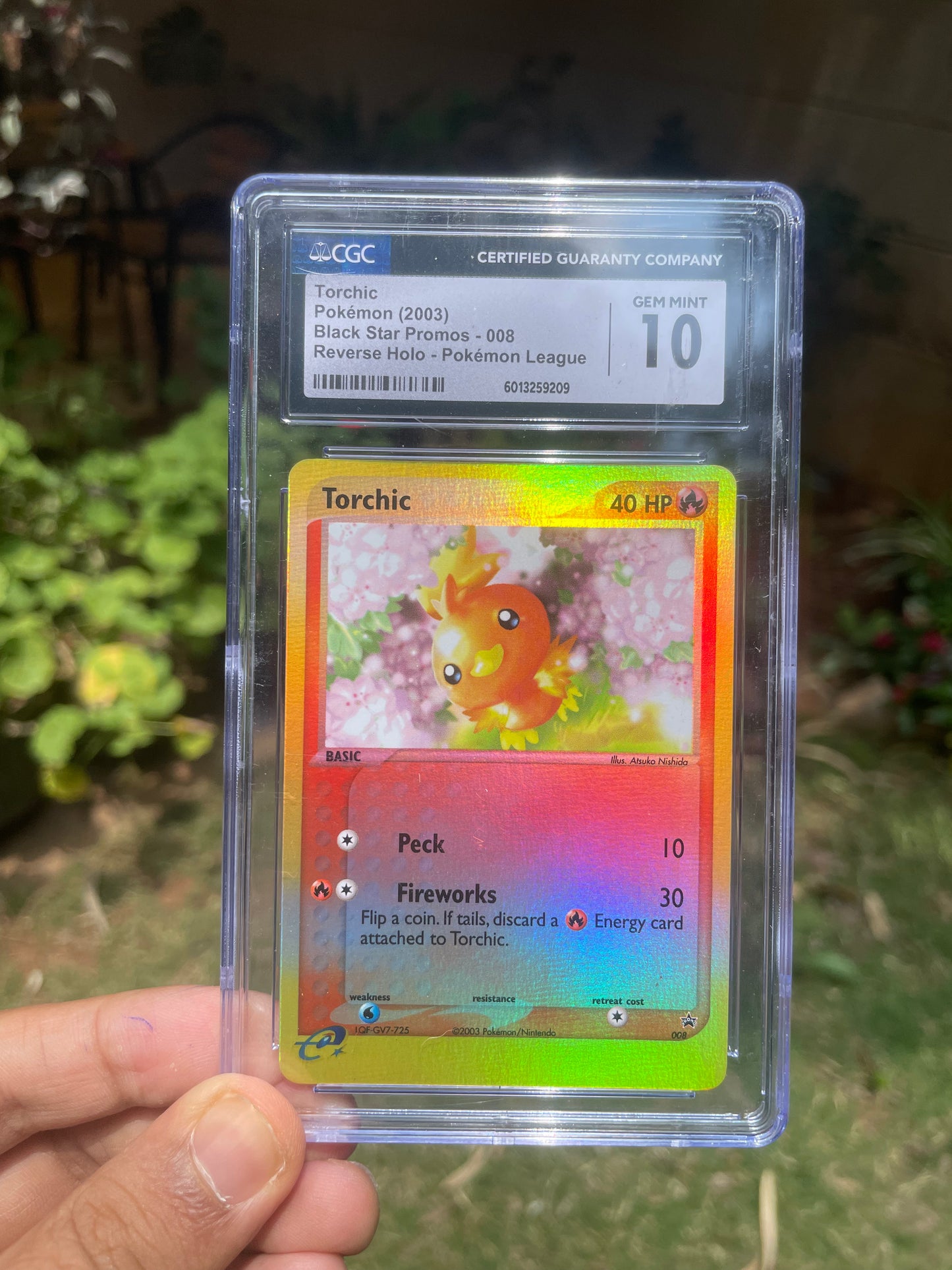 (CGC 10) 2003 Promo 008 Torchic [Reverse]